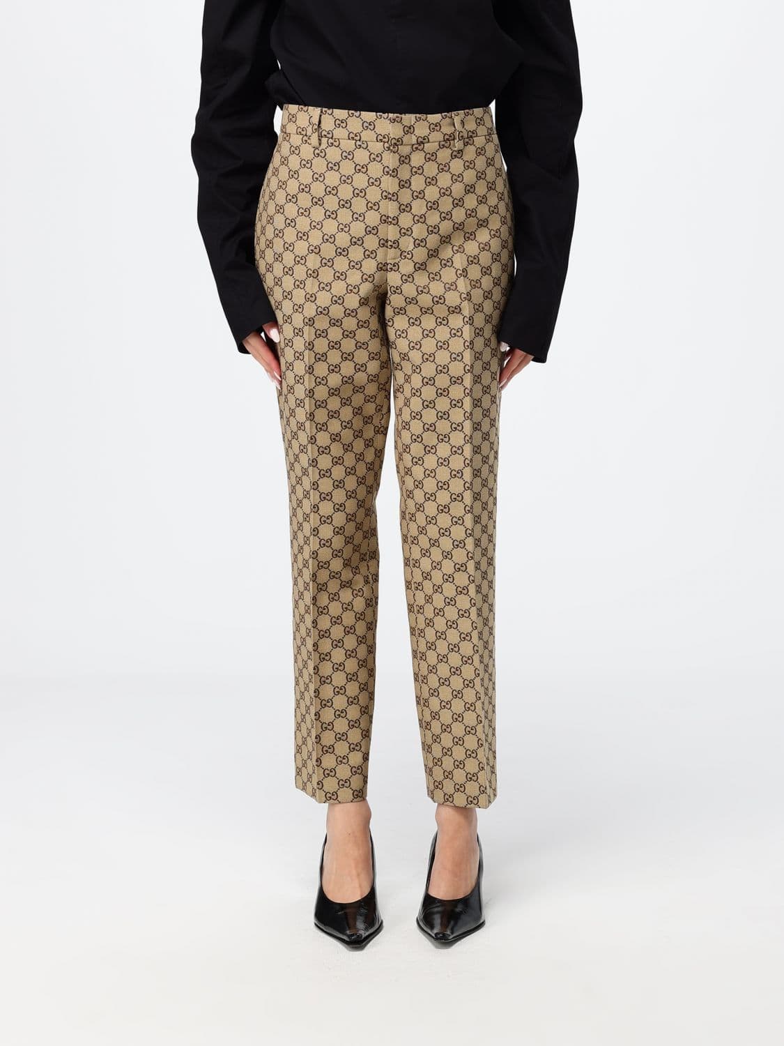 Gucci Slim Fit Cropped Trousers in GG Supreme Fabric with Monogram Pattern · 38