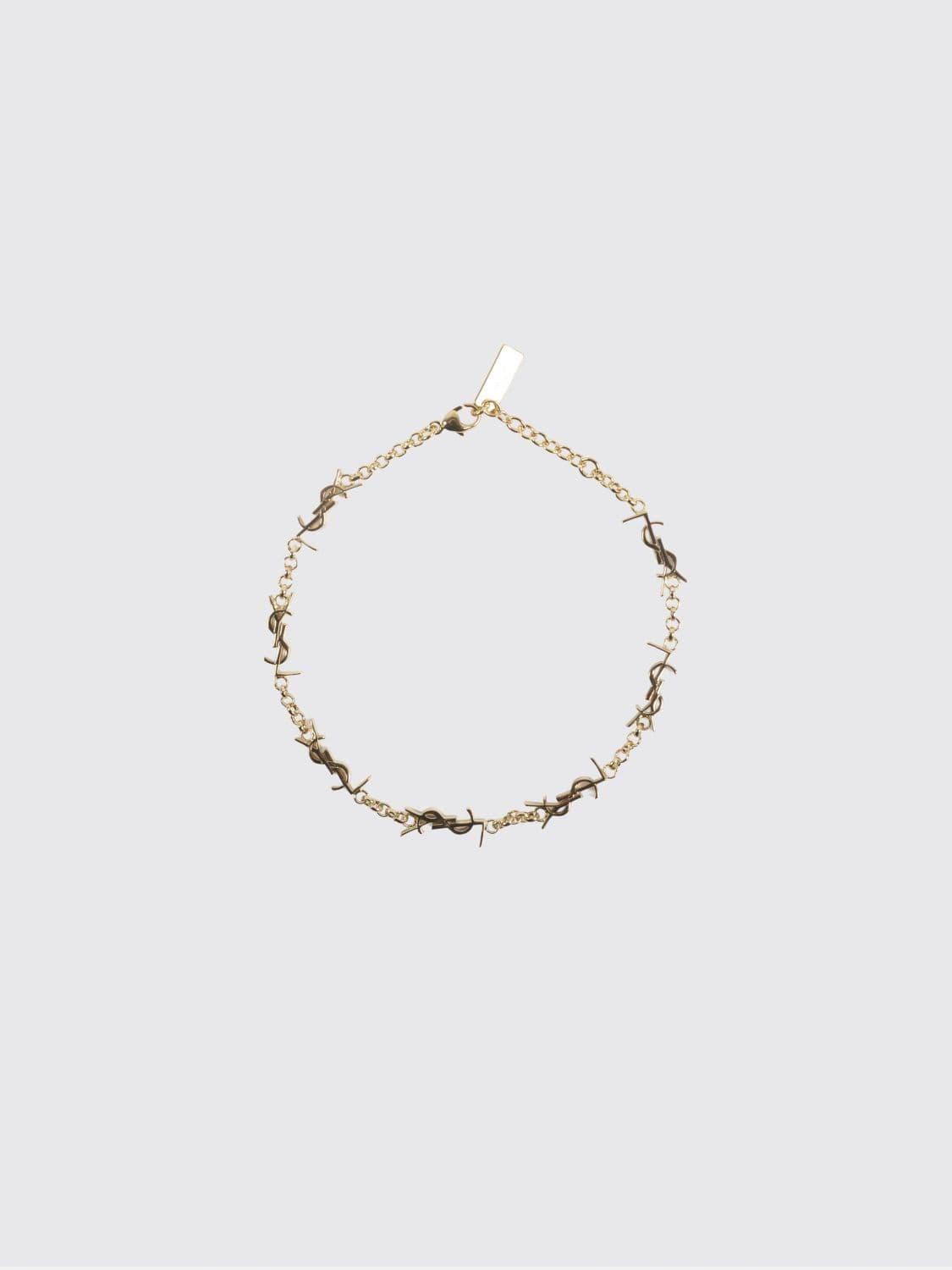 Saint Laurent Gold-Tone Metal Bracelet with Interlaced YSL Monogram Pendant