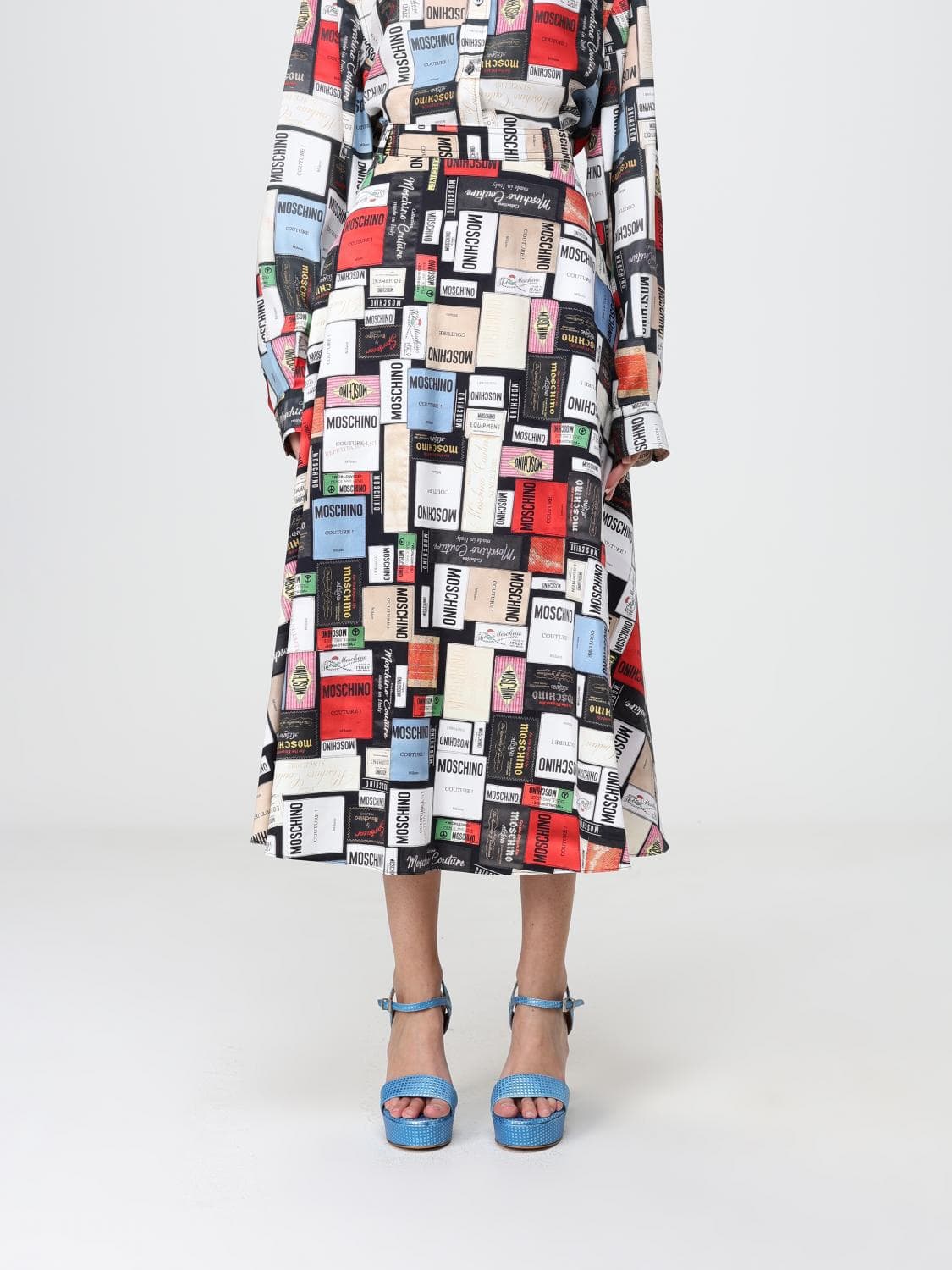 Moschino Couture High-Waisted A-Line Midi Skirt in Cotton with Graphic Print
