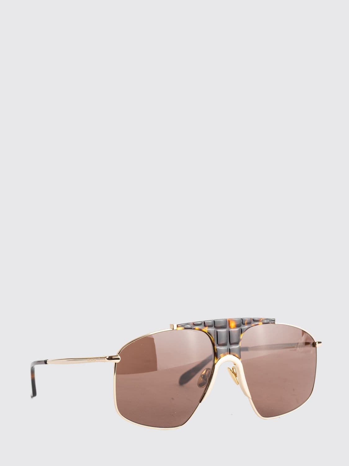 Alaïa Sunglasses Woman color Gold