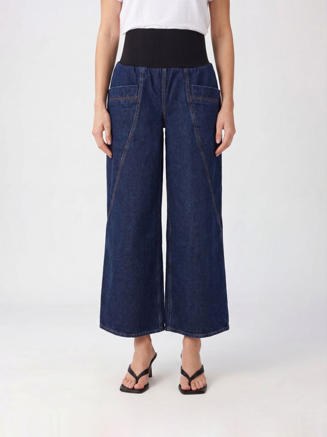 Alaïa High-Waisted Wide-Leg Palazzo Jeans in Denim