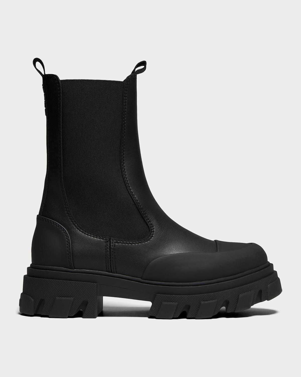 Retailer photograph of Ganni Cleated Leather Mid Chelsea Boots.