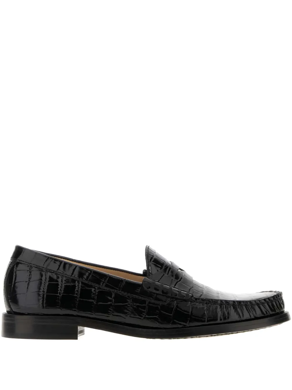 Retailer photograph of Stuart Weitzman Lottie crocodile-embossed loafers.